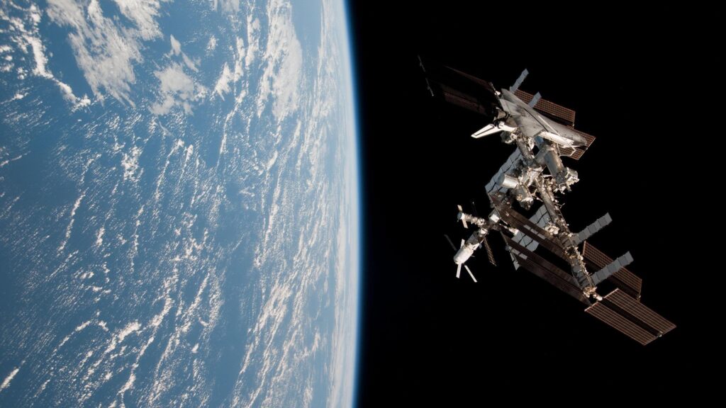space shuttle docked to iss